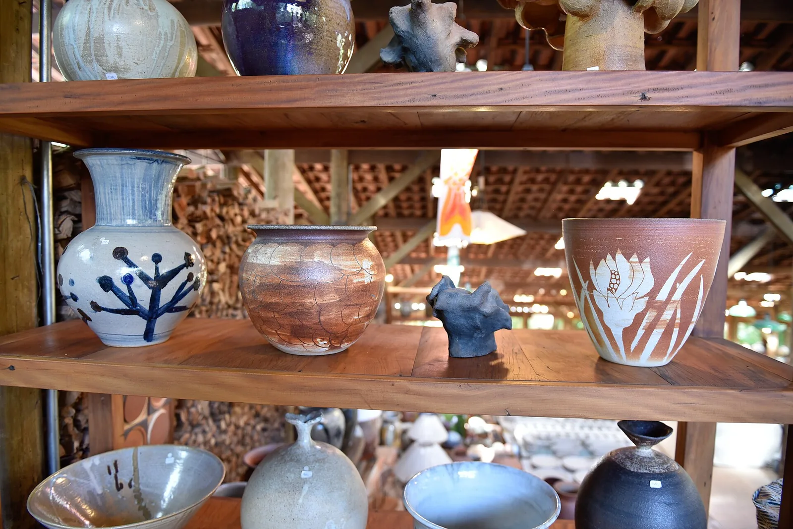 Hand-thrown pieces cooling after the firing, in one of the town's many open workshops.