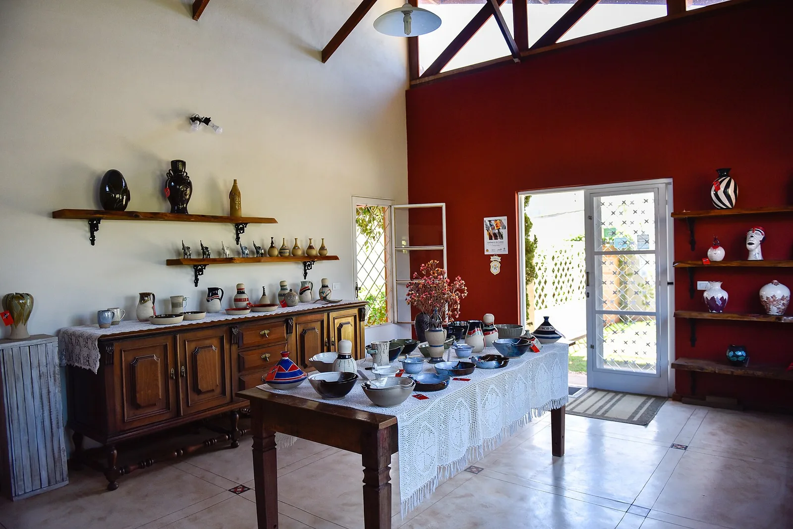 Finished ceramics on display — each one marked by where it sat in the kiln and how the flame and ash reached it.