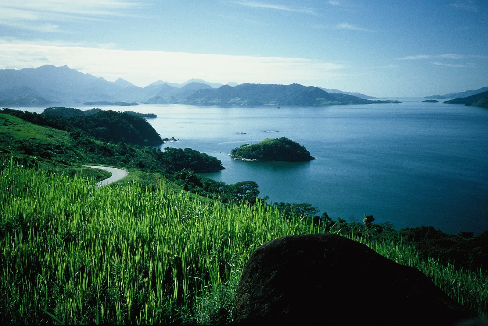 Ilha Grande seen from the water — forested, road-free, and an hour by boat from the Costa Verde mainland.