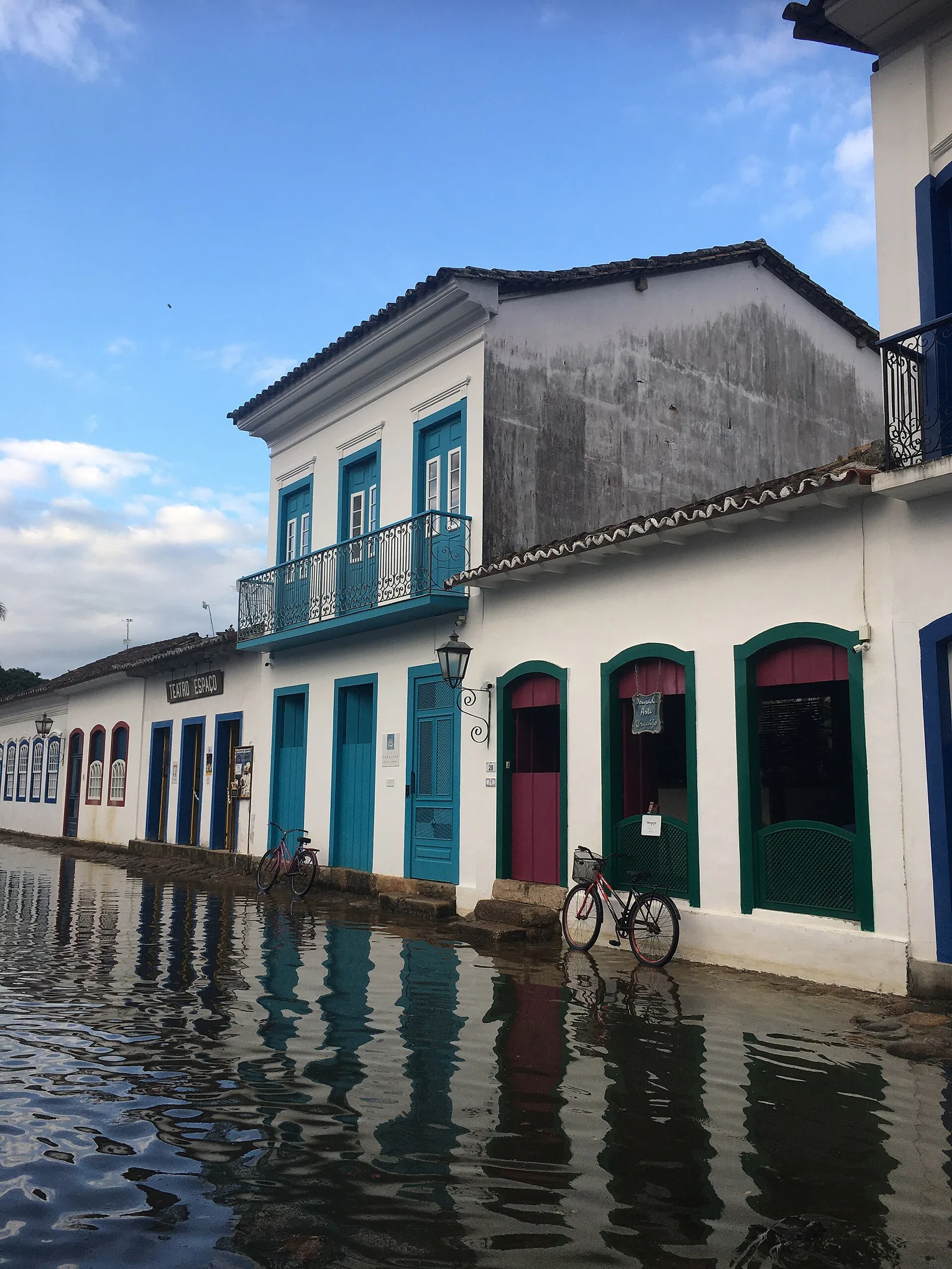 The old harbour at Paraty, still a working waterfront where boats load ice at dawn.