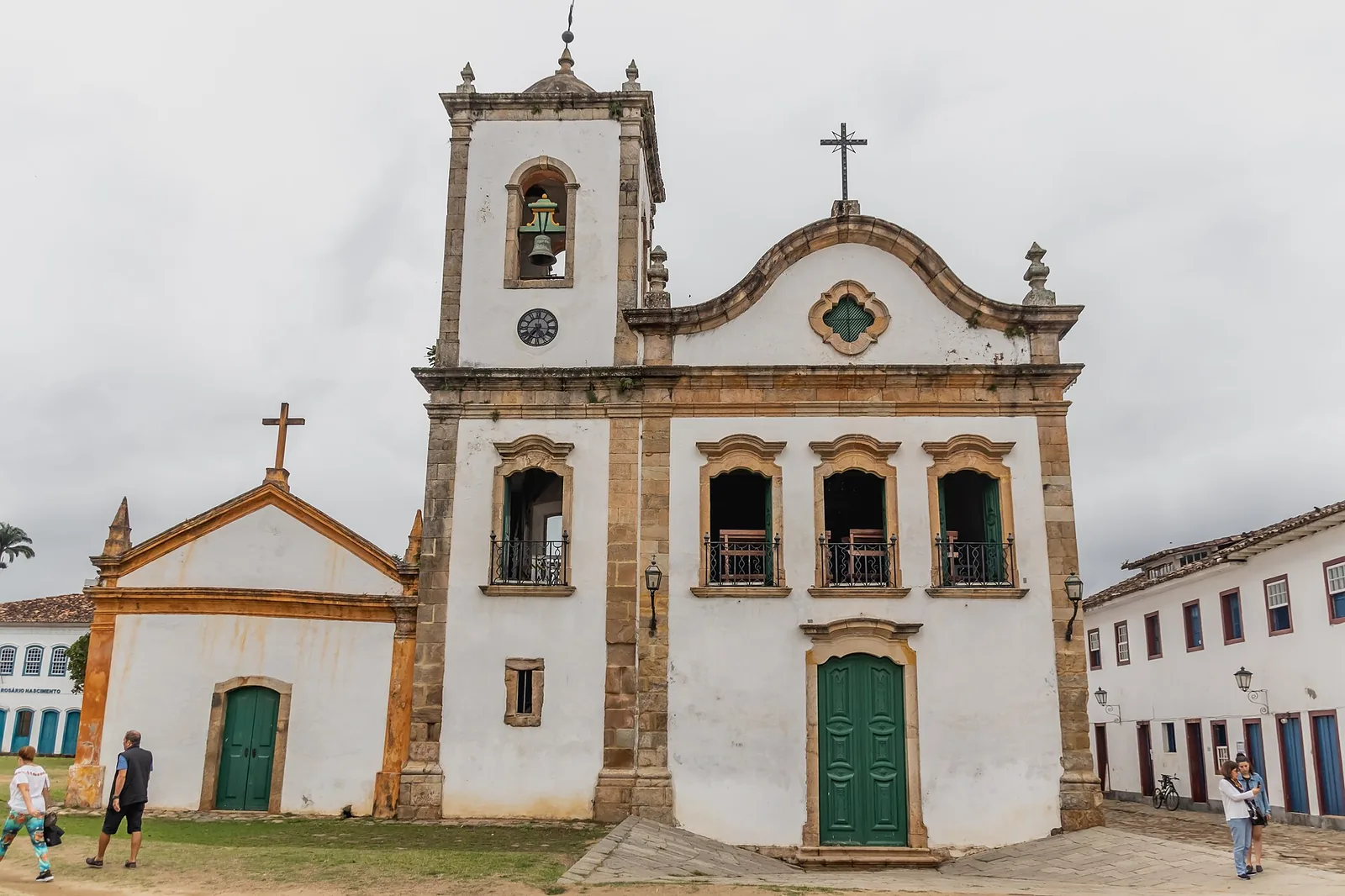 The Igreja de Santa Rita de Cássia, the oldest of Paraty's churches, standing where the town meets the water.